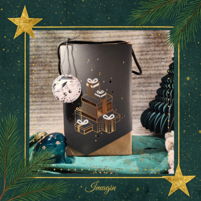 Caja de regalo ennegro con motivos de cajas de regalo en dorado